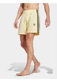 Adidas - adidas Szorty kąpielowe Originals Adicolor 3-Stripes Swim Shorts HT4410 Żółty Regular Fit. Kolor: żółty. Materiał: syntetyk #1