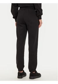 Champion Spodnie dresowe 117583 Czarny Regular Fit. Kolor: czarny. Materiał: bawełna #4