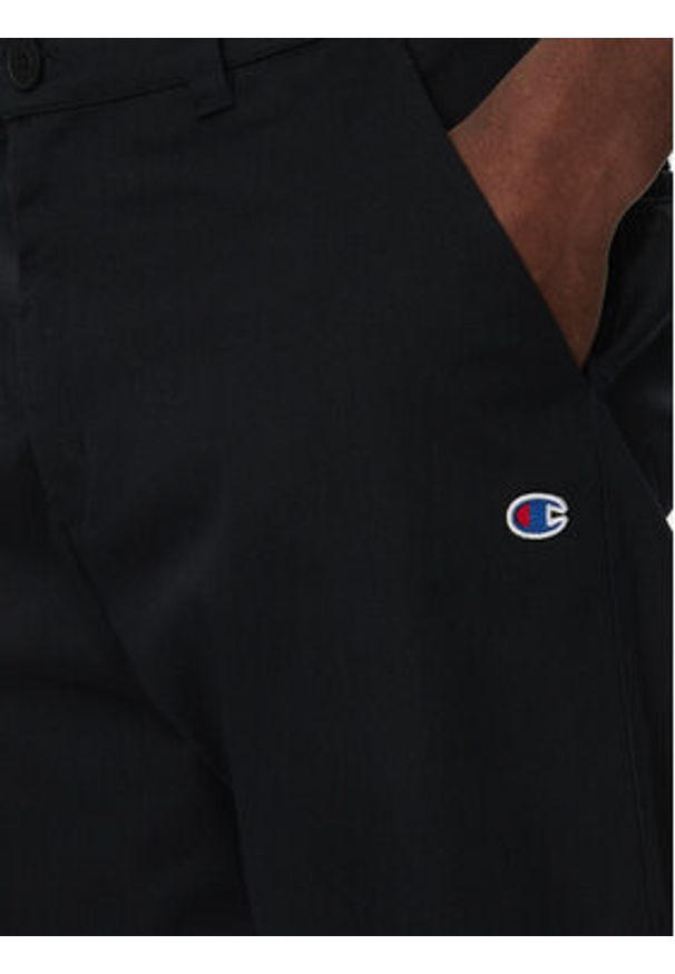 Champion Spodnie materiałowe 220715 Czarny Regular Fit. Kolor: czarny. Materiał: syntetyk