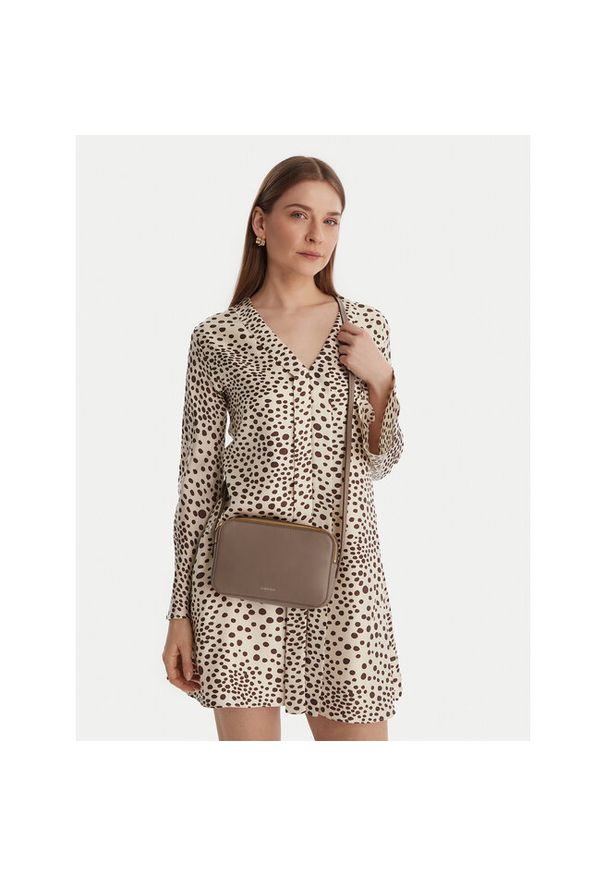 Torebka Calvin Klein. Kolor: beżowy