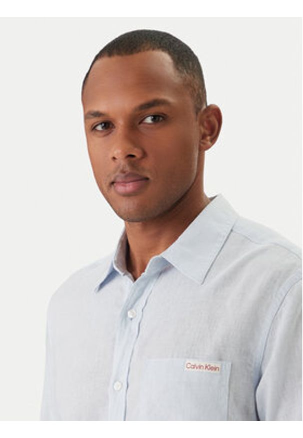 Calvin Klein Jeans Koszula LV04RF121G Błękitny Regular Fit. Kolor: niebieski. Materiał: len, wiskoza