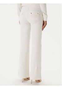 Juicy Couture Spodnie dresowe Layla JCSEBJ001G Beżowy Regular Fit. Kolor: beżowy. Materiał: syntetyk #3