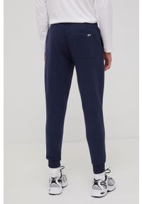 Tommy Jeans Spodnie męskie kolor granatowy z aplikacją. Kolor: niebieski. Materiał: włókno, materiał, dzianina. Wzór: aplikacja