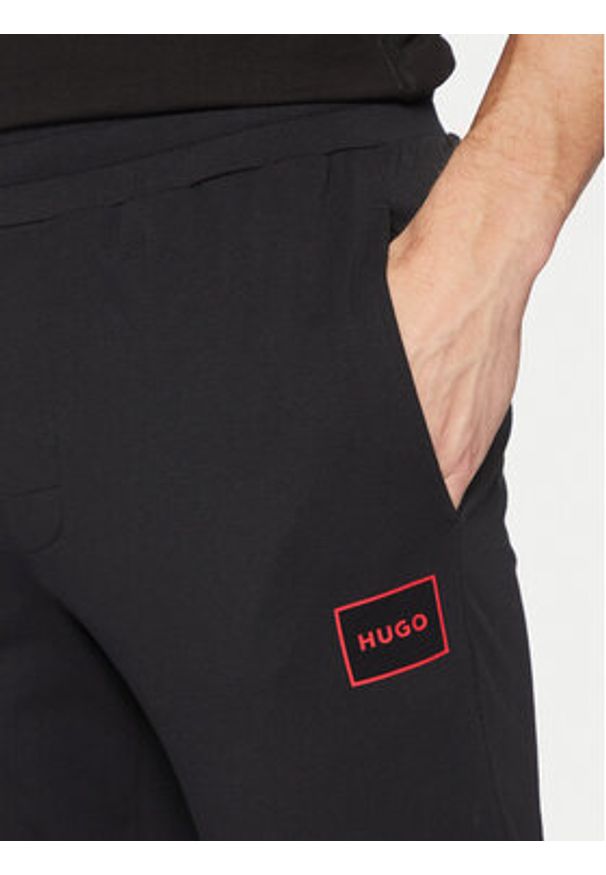 Hugo Spodnie dresowe 50525246 Czarny Regular Fit. Kolor: czarny. Materiał: bawełna