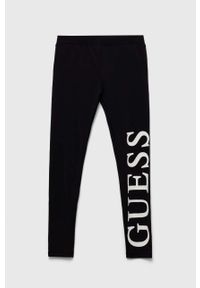 Guess legginsy dziecięce kolor czarny z nadrukiem. Kolor: czarny. Wzór: nadruk #1