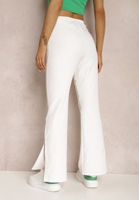 Renee - Białe Spodnie Dzwony Evissa. Kolor: biały. Materiał: koronka. Długość: krótkie. Wzór: jednolity. Styl: elegancki