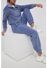 Tommy Jeans Spodnie damskie kolor fioletowy gładkie. Kolor: fioletowy. Materiał: poliester, dzianina. Wzór: gładki
