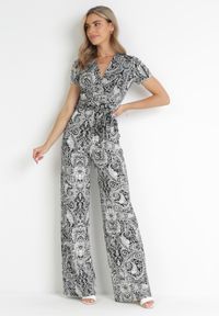 Born2be - Czarno-Szary Kwiecisty Kombinezon z Kopertowym Dekoltem i Materiałowym Paskiem Catarinja. Kolor: szary. Materiał: materiał. Styl: boho #1