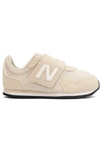 Buty niemowlęce New Balance IV323AC – beżowe. Okazja: na uczelnię, na co dzień. Kolor: beżowy. Materiał: syntetyk, materiał. Szerokość cholewki: normalna