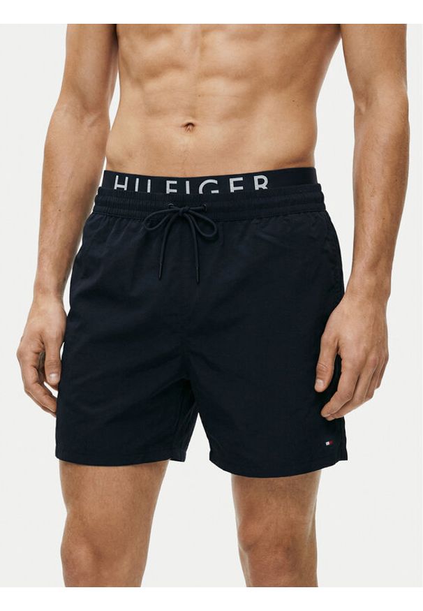 TOMMY HILFIGER - Tommy Hilfiger Szorty kąpielowe UM0UM03749 Granatowy Regular Fit. Kolor: niebieski. Materiał: syntetyk