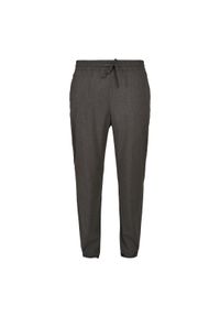 Spodnie joggingowe Urban Classics zwężane. Kolor: szary. Materiał: dresówka #1