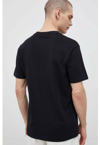 New Balance t-shirt bawełniany kolor czarny gładki MT31542BK-2BK. Kolor: czarny. Materiał: bawełna. Długość rękawa: krótki rękaw. Długość: krótkie. Wzór: gładki #5