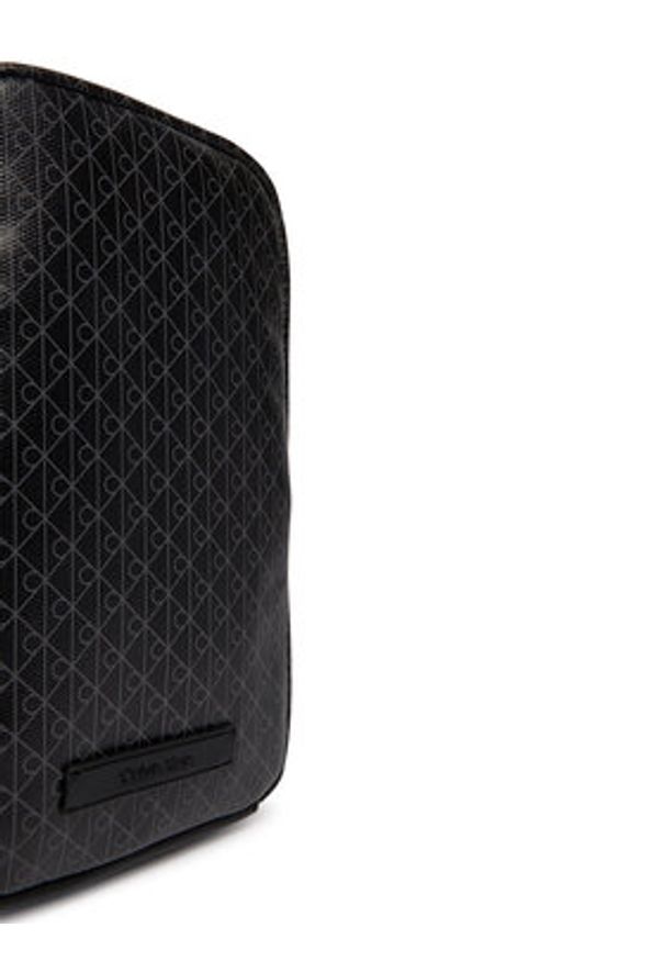 Calvin Klein Saszetka Emblem Aop Coated Square Sling LV04D3335G Czarny. Kolor: czarny. Materiał: skóra
