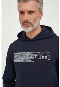 Guess bluza męska kolor granatowy z kapturem z aplikacją. Typ kołnierza: kaptur. Kolor: niebieski. Wzór: aplikacja #4