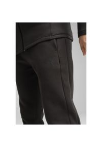 Puma - Męskie spodnie Evostripe Core PUMA Black. Kolor: czarny