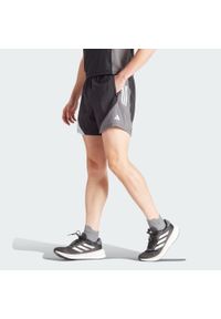 Adidas - Szorty Own The Run Colorblock. Kolor: czarny, szary, brązowy, wielokolorowy. Materiał: materiał. Sport: bieganie