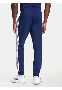 Adidas - adidas Spodnie dresowe Essentials 3-Stripes JD1859 Niebieski Regular Fit. Kolor: niebieski. Materiał: syntetyk #4