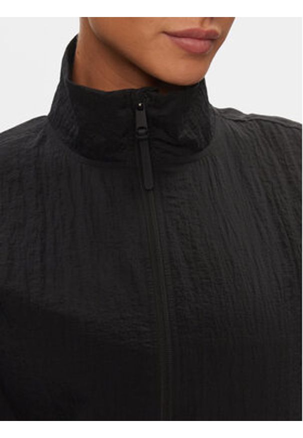 Calvin Klein Performance Wiatrówka 00GWS4O516 Czarny Relaxed Fit. Kolor: czarny. Materiał: syntetyk