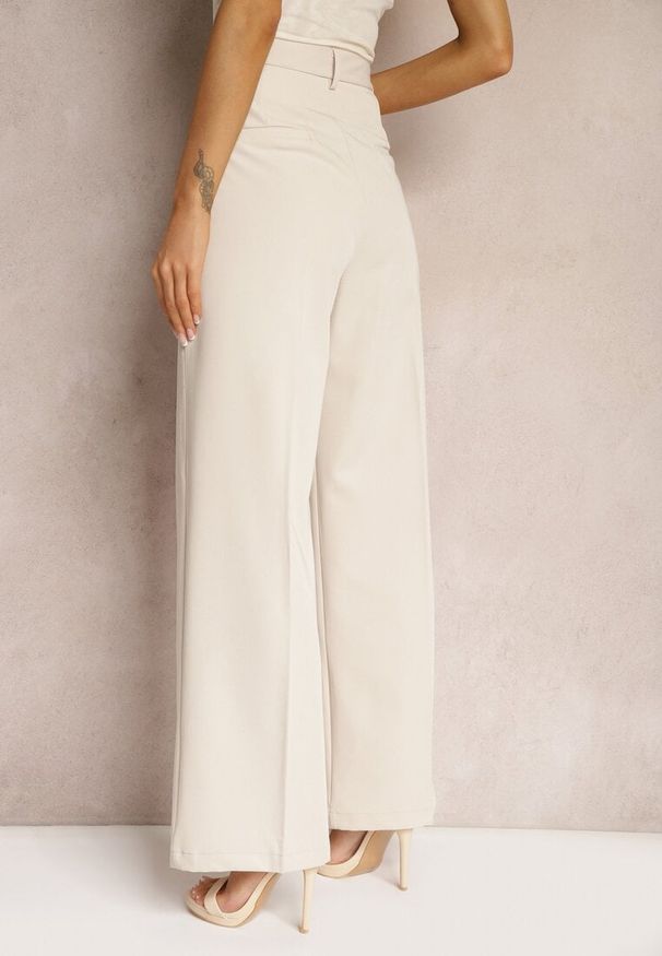 Renee - Jasnobeżowe Szerokie Spodnie High Waist Seraphella. Stan: podwyższony. Kolor: beżowy