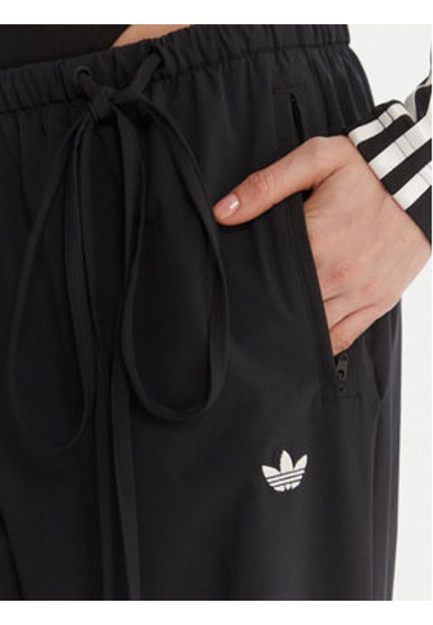 Adidas - adidas Spodnie dresowe Ribbon Parachute JV9727 Czarny Loose Fit. Kolor: czarny. Materiał: syntetyk