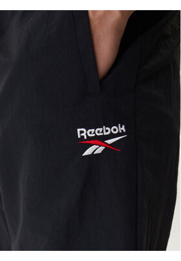 Reebok Spodnie dresowe Barrett RK25552CCM Czarny Regular Fit. Kolor: czarny. Materiał: syntetyk