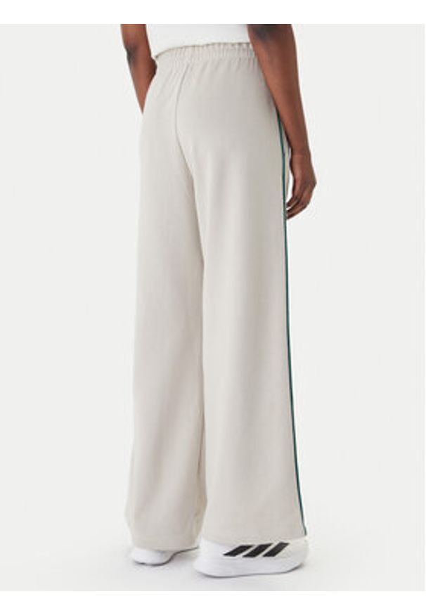 Adidas - adidas Spodnie dresowe Seasonal Essentials Colourpop JZ0192 Beżowy Regular Fit. Kolor: beżowy. Materiał: bawełna