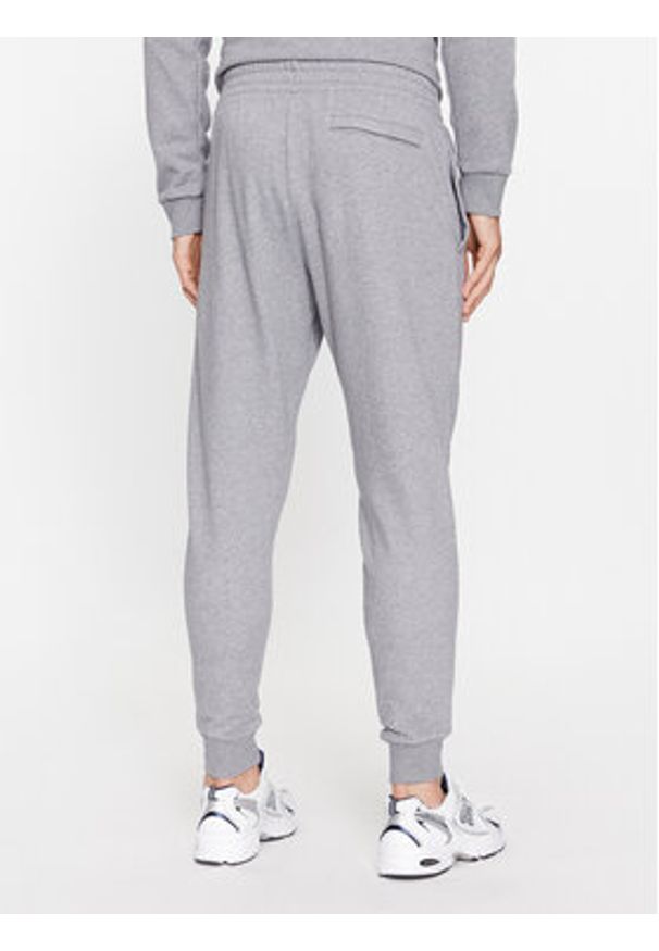 Under Armour Spodnie dresowe Ua Rival Fleece Joggers 1379774 Szary Loose Fit. Kolor: szary. Materiał: bawełna