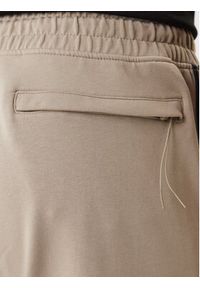 Guess Spodnie dresowe Z2YB19 K6ZS1 Beżowy Regular Fit. Kolor: beżowy. Materiał: bawełna #2