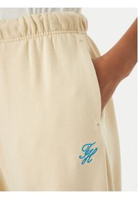 TOMMY HILFIGER - Tommy Hilfiger Spodnie dresowe Logo Embroidery WW0WW49706 Beżowy jasny Regular Fit. Kolor: beżowy. Materiał: bawełna #4