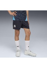 Puma - Młodzieżowe spodnie treningowe Olympique Marsylia PUMA New Navy White Blue. Kolor: niebieski, wielokolorowy, biały. Sport: piłka nożna