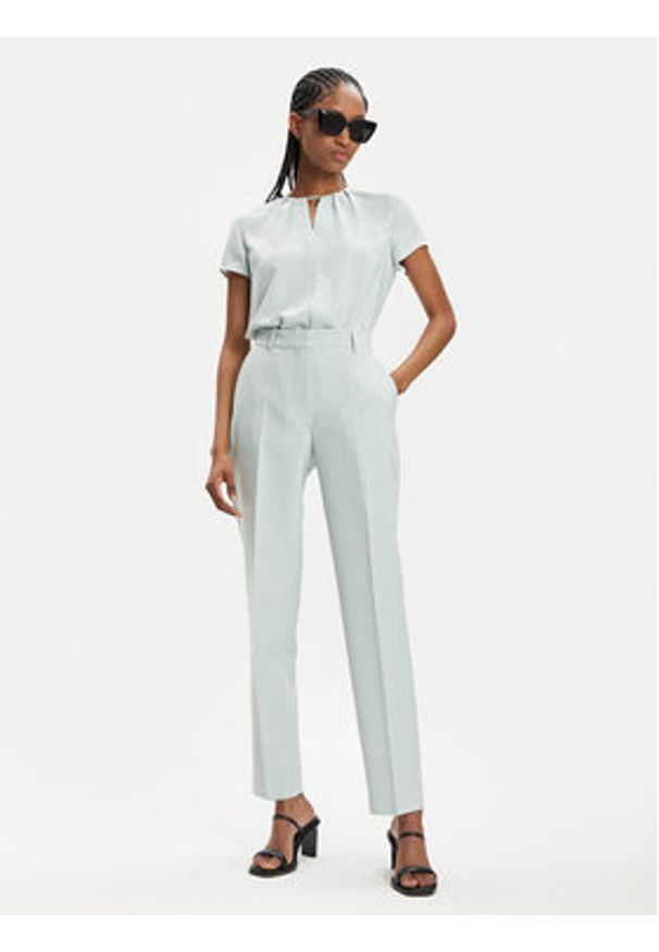 Calvin Klein Chinosy K20K205959 Zielony Slim Fit. Kolor: zielony. Materiał: wiskoza, syntetyk