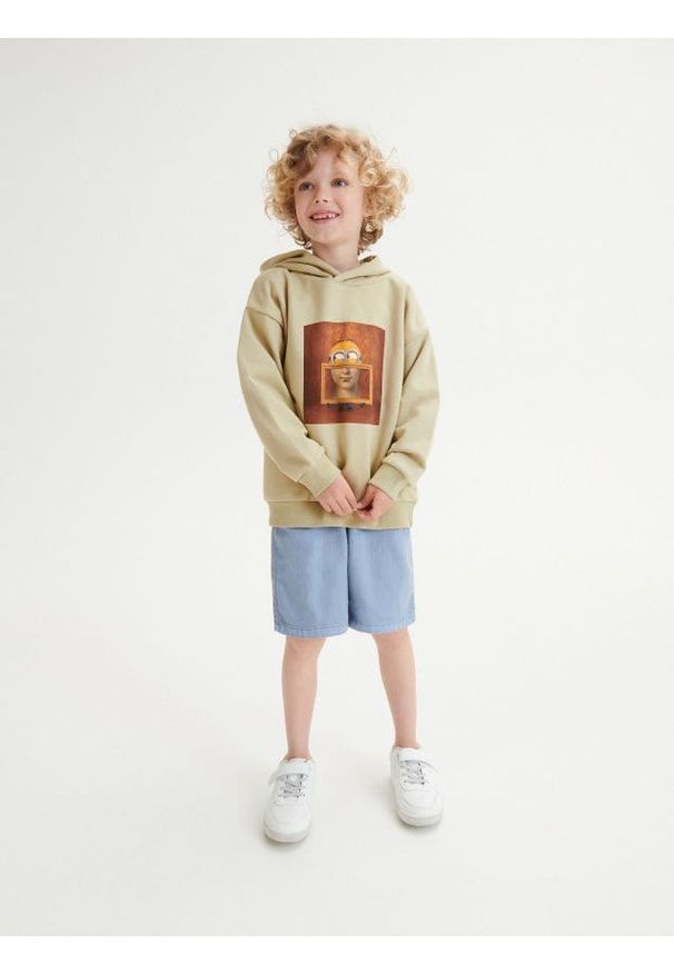 Reserved - Bluza oversize Minionki - beżowy. Kolor: beżowy. Materiał: dzianina, bawełna. Wzór: motyw z bajki