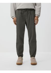 Reserved - Jeansy jogger fit - zielony. Kolor: zielony