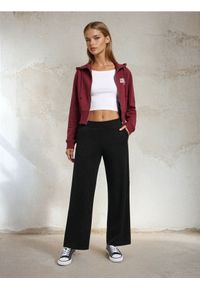 Sinsay - Spodnie dresowe z szerokimi nogawkami soft touch - czarny. Kolor: czarny. Materiał: dresówka