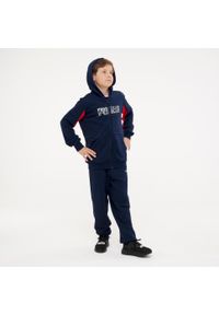 Dres dziecięcy Puma. Okazja: na uczelnię. Kolor: czerwony, niebieski, wielokolorowy. Materiał: dresówka. Styl: sportowy