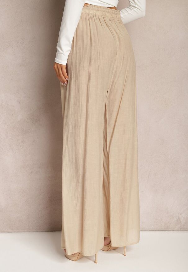 Renee - Beżowe Wiskozowe Spodnie Szerokie z Gumką i Sznurkiem w Pasie Tarallia. Okazja: na co dzień. Kolor: beżowy. Materiał: wiskoza. Styl: casual, elegancki