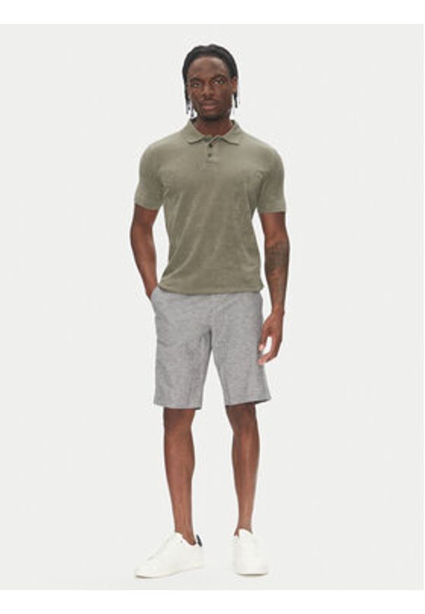 Lindbergh Polo 30-404263 Beżowy Relaxed Fit. Typ kołnierza: polo. Kolor: beżowy. Materiał: bawełna