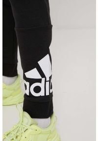 Adidas - adidas spodnie GK8968 męskie kolor czarny z nadrukiem. Kolor: czarny. Materiał: bawełna, poliester. Wzór: nadruk #2