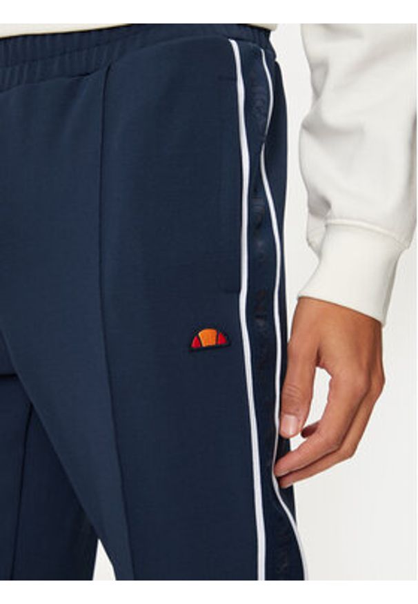 Ellesse Spodnie dresowe Inzagi SHX20959 Granatowy Regular Fit. Kolor: niebieski. Materiał: syntetyk