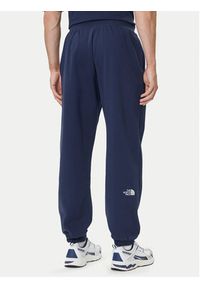 The North Face Spodnie dresowe Essential NF0A8C1F Granatowy Relaxed Fit. Kolor: niebieski. Materiał: bawełna, syntetyk #4