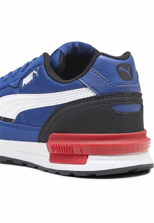 Buty do chodzenia dla dzieci Puma Graviton. Zapięcie: sznurówki. Kolor: biały. Materiał: materiał. Szerokość cholewki: normalna. Sport: turystyka piesza