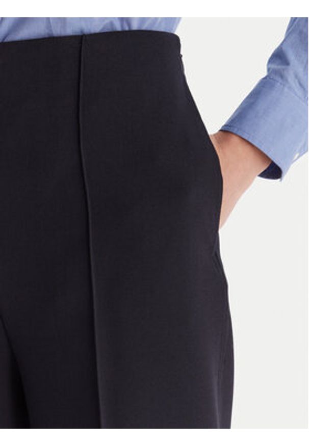 TOMMY HILFIGER - Tommy Hilfiger Spodnie palazzo WW0WW48406 Granatowy Wide Leg. Kolor: niebieski. Materiał: syntetyk