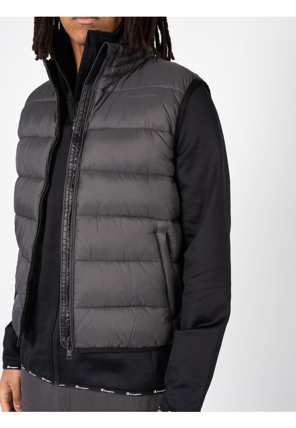 Champion Bezrękawnik "Down Vest" | 218078 | Mężczyzna | Grafitowy. Typ kołnierza: kołnierzyk stójkowy. Kolor: szary. Materiał: poliamid. Długość rękawa: bez rękawów. Wzór: nadruk. Styl: elegancki, sportowy