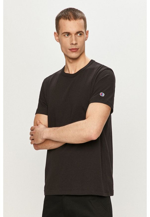 Champion - T-shirt. Okazja: na co dzień. Kolor: czarny. Materiał: dzianina. Wzór: gładki, aplikacja. Styl: casual