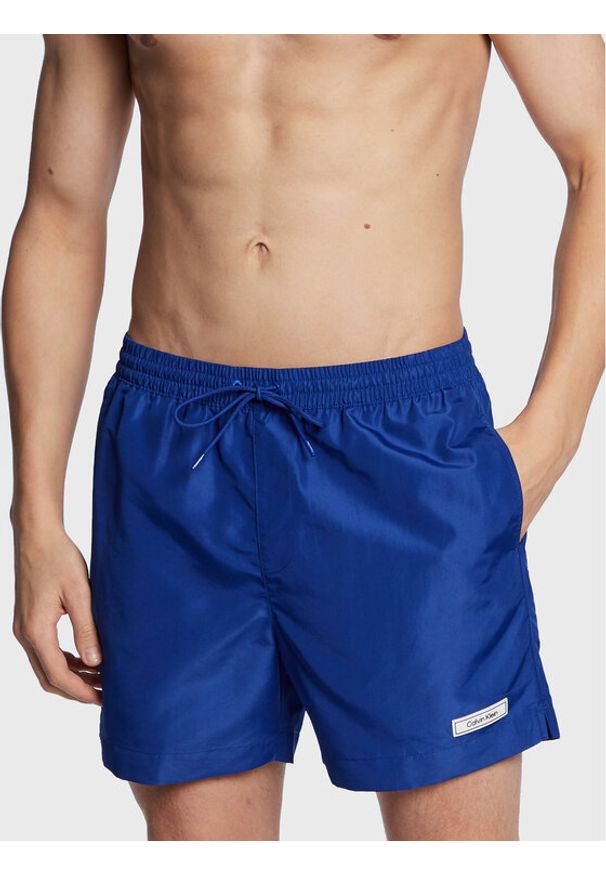 Szorty kąpielowe Calvin Klein Swimwear. Kolor: niebieski. Materiał: syntetyk