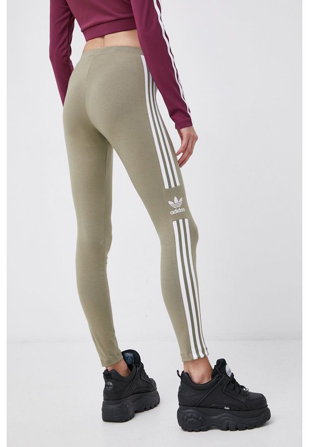 adidas Originals - Legginsy. Kolor: zielony. Materiał: dzianina