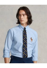 Ralph Lauren - RALPH LAUREN - Niebieska koszula z misiem Polo Custom Fit. Typ kołnierza: polo. Kolor: niebieski. Materiał: bawełna. Długość rękawa: długi rękaw. Długość: długie. Wzór: haft, kolorowy. Styl: klasyczny