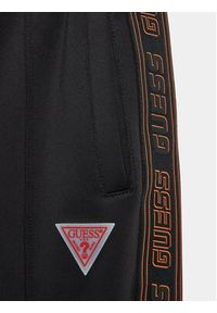Guess Spodnie dresowe L3BQ16 KB212 Czarny Relaxed Fit. Kolor: czarny. Materiał: syntetyk #3