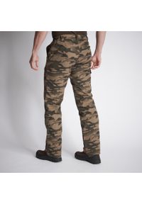 SOLOGNAC - Spodnie Warm 100 camo haltfone. Kolor: beżowy. Materiał: materiał