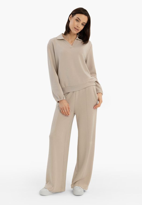 Volcano - Spodnie dresowe z szeroką nogawką N-ERLA. Materiał: dresówka. Wzór: gładki